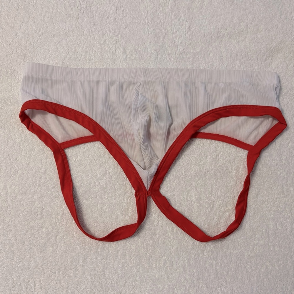 White with red jockstrap. XL Worn a few times.